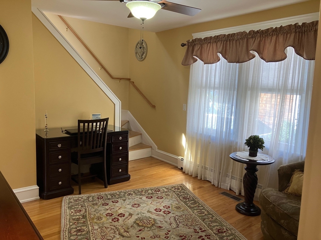 93 Crown Avenue Riverside, RI 02915 - Photo 18 of 33 a room with furniture and a rug