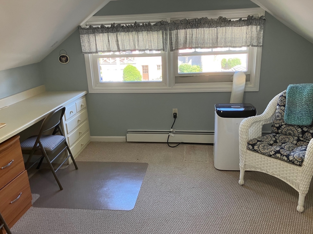 93 Crown Avenue Riverside, RI 02915 - Photo 24 of 33 a room with window and a table