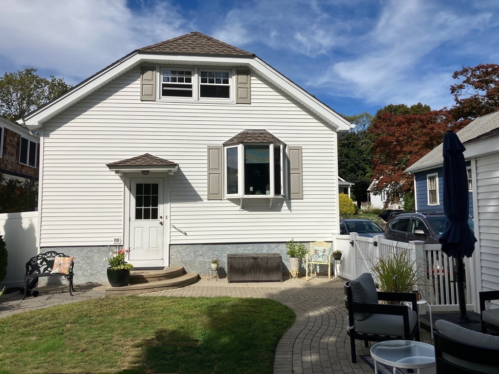 93 Crown Avenue Riverside, RI 02915 - Photo 26 of 33 a front view of a house with patio