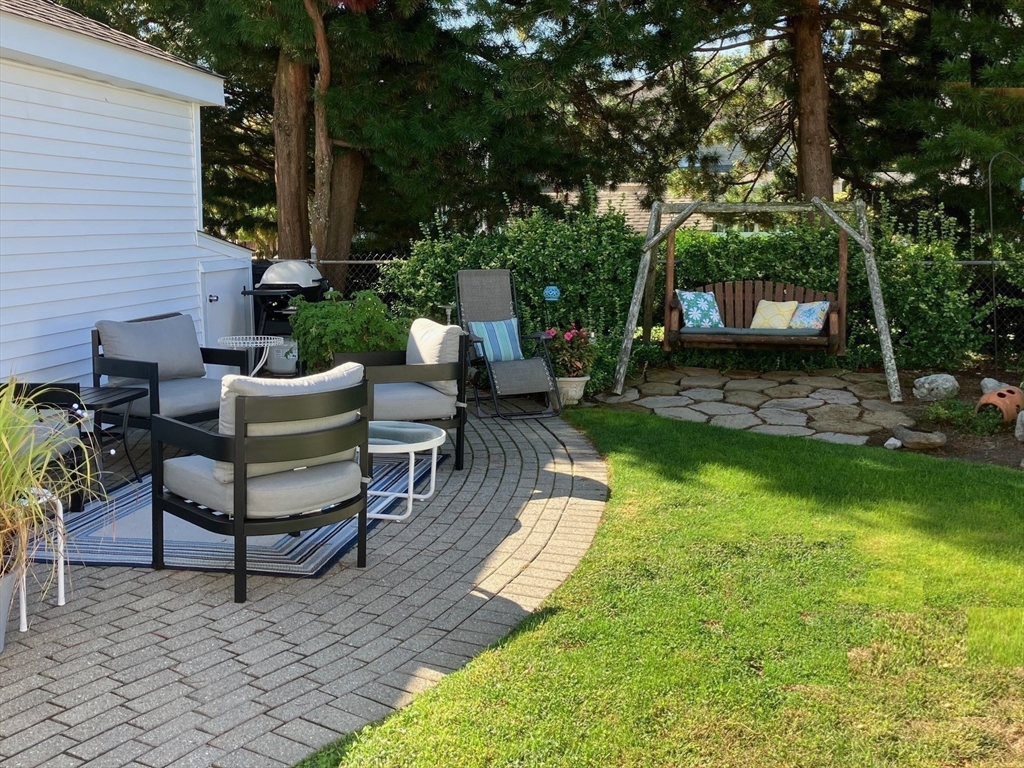 93 Crown Avenue Riverside, RI 02915 - Photo 29 of 33 a view of a backyard with sitting area