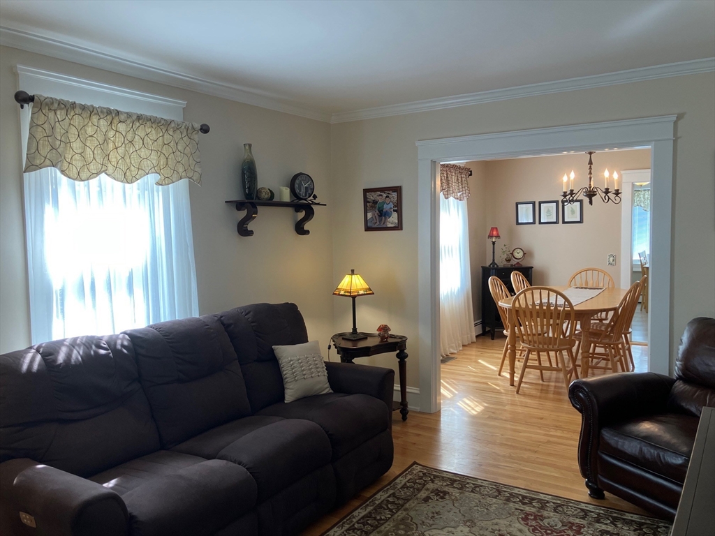 93 Crown Avenue Riverside, RI 02915 - Photo 6 of 33 a living room with furniture and a window