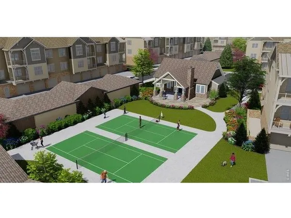 a view of a park with a sign of board and mountain view