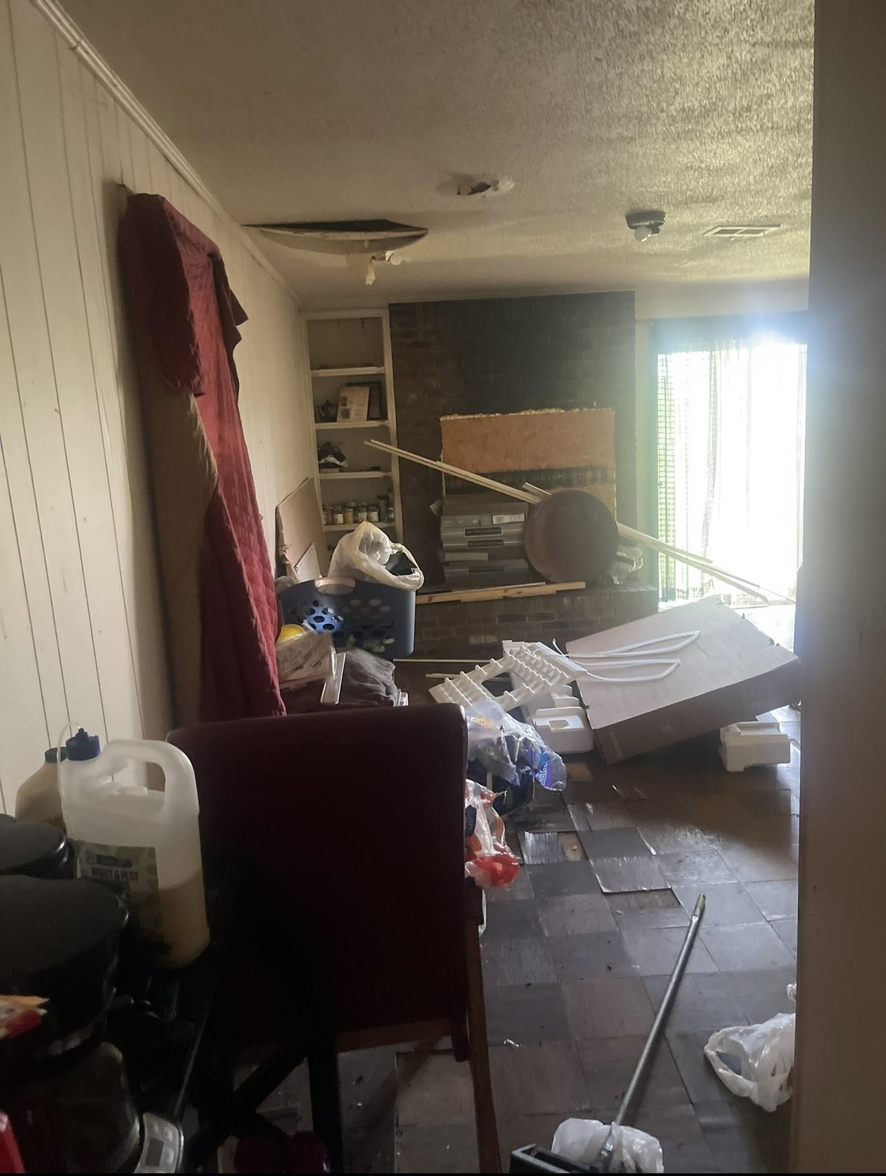 1679 Ragan Street Memphis, TN 38106 - Photo 8 of 9 a living room with furniture and a window