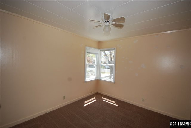 1024 Bell Street Reno, NV 89503 - Photo 9 of 13 an empty room with windows and fan