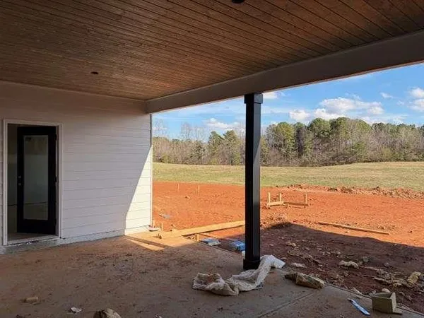 a view of a room next to a large window