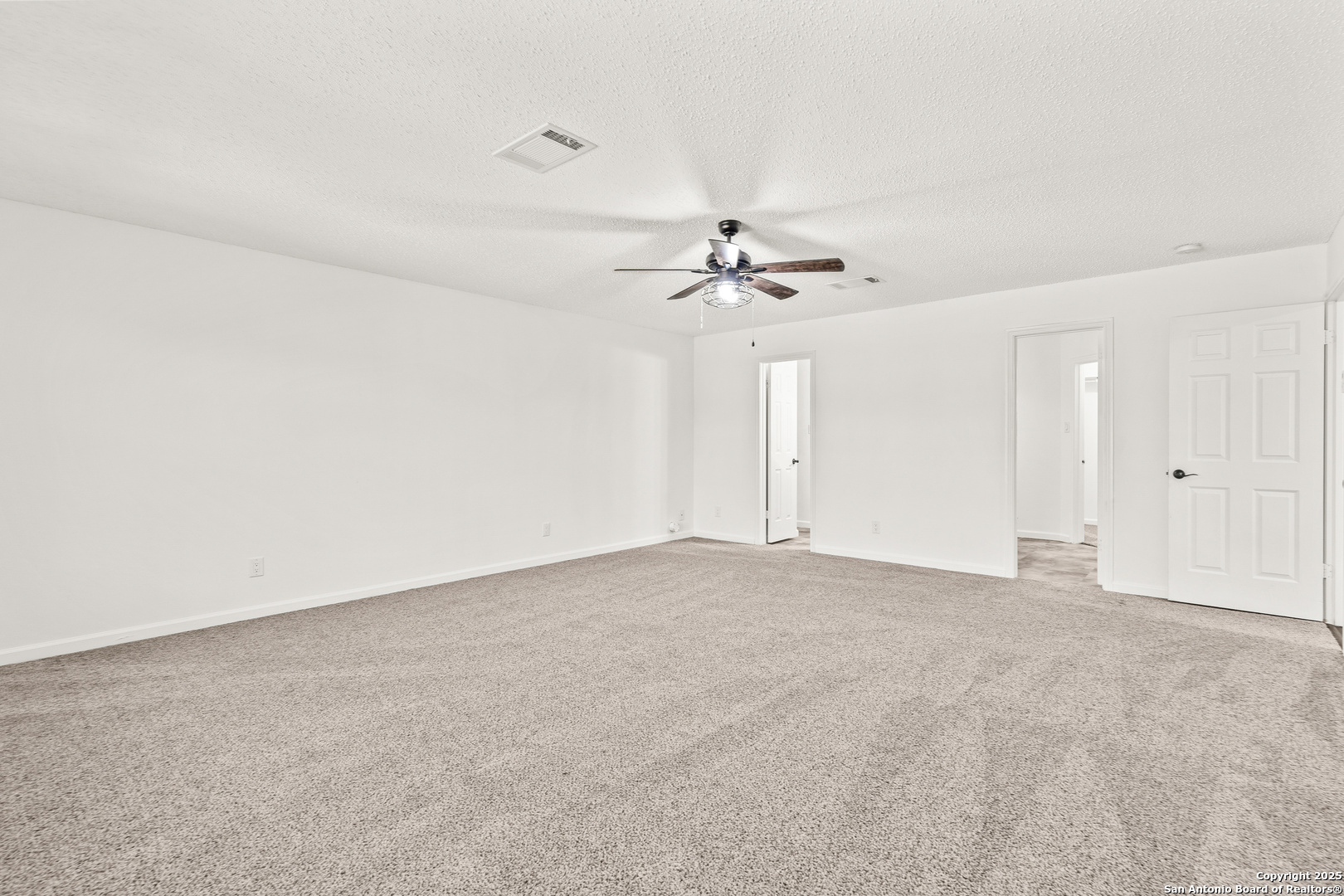1687 Fir Circle Schertz, TX 78154 - Photo 14 of 25 wooden floor in an empty room