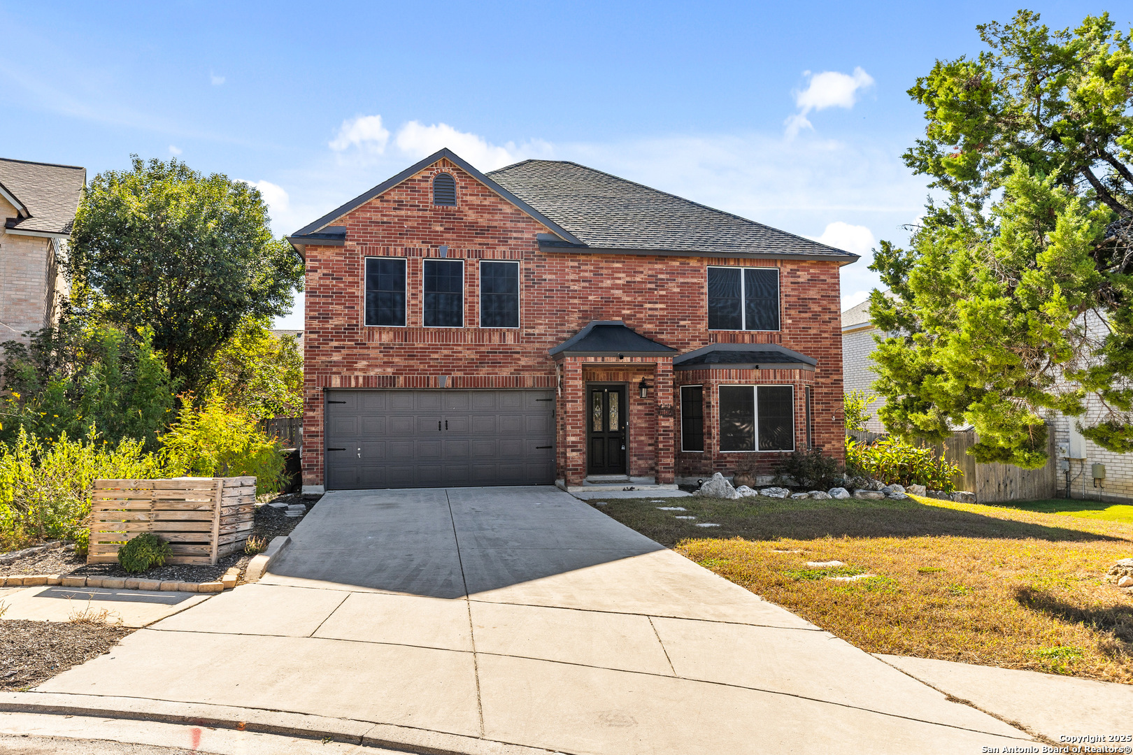 1687 Fir Circle Schertz, TX 78154 - Photo 2 of 25 a front view of house with yard