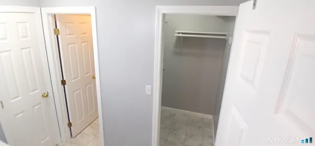 a view of a room that has a window