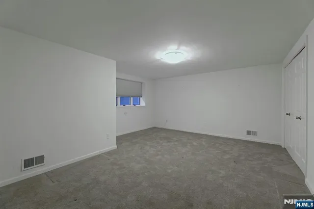 an empty room with a workbench