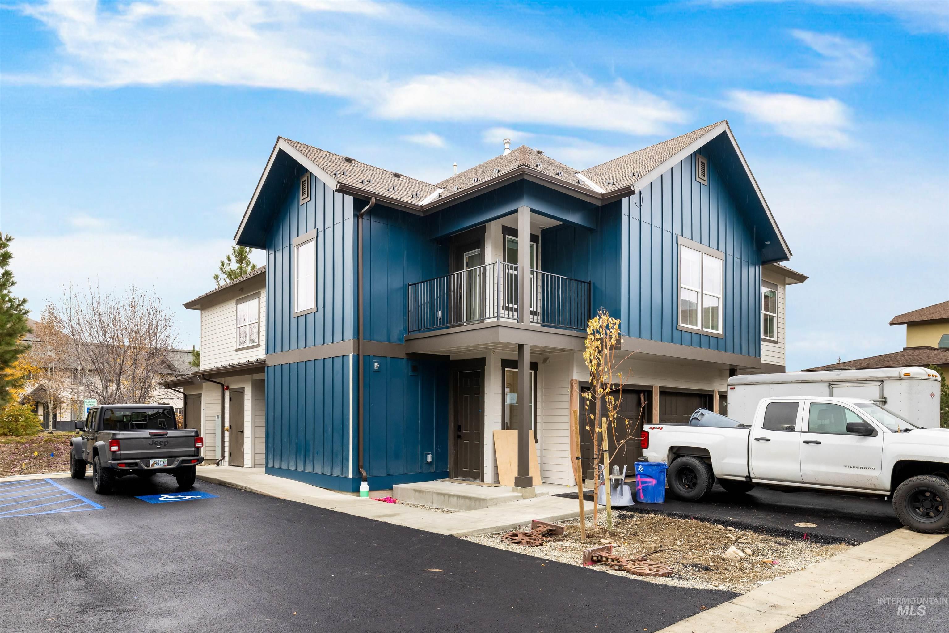 2010 Wimbledon Court Hailey, ID 83333 - Photo 27 of 46 View of front of property with board and batten siding and a balcony