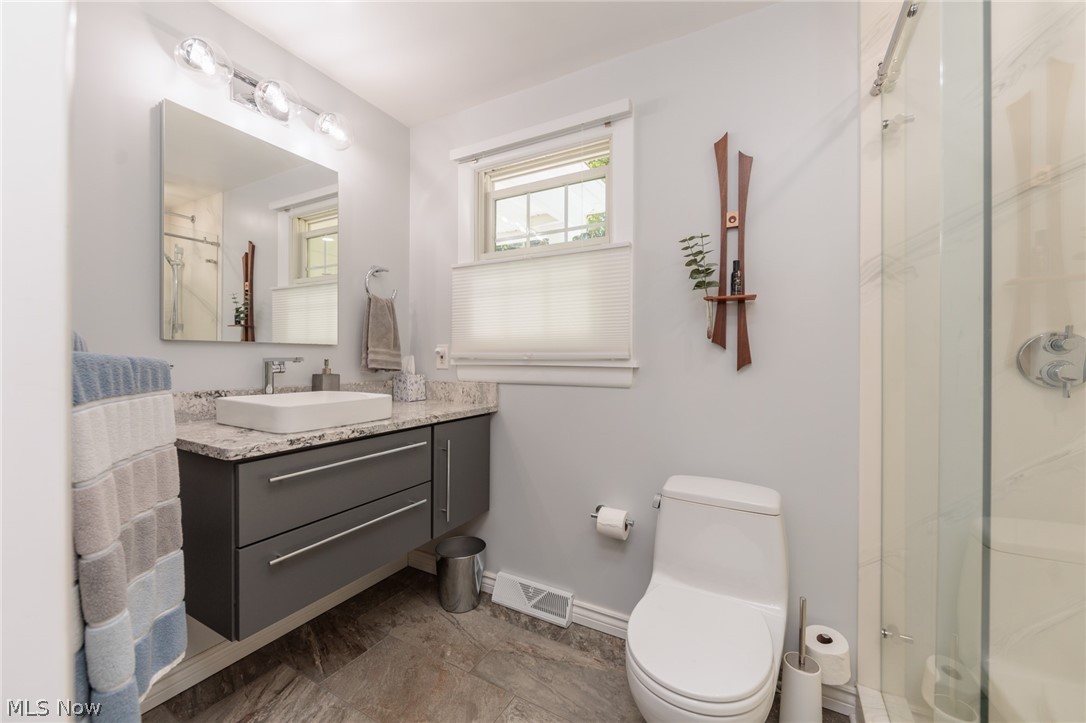 4511 Ranchwood Road Akron, OH 44333 - Photo 21 of 38 Full bath with heated floors