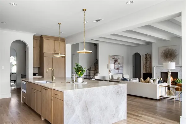 a spacious bathroom with a double vanity sink and a mirror
