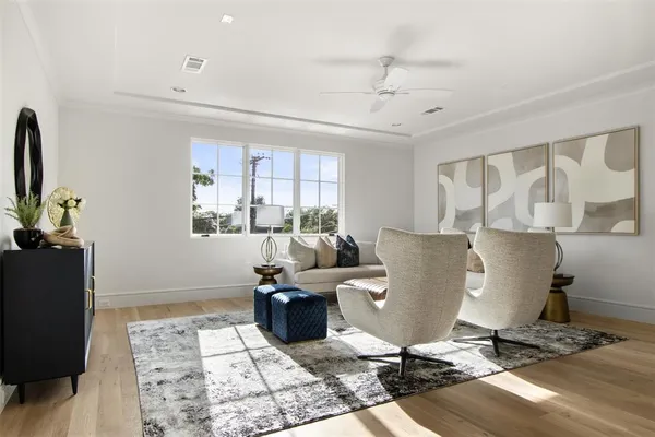 a living room with a couch and a window