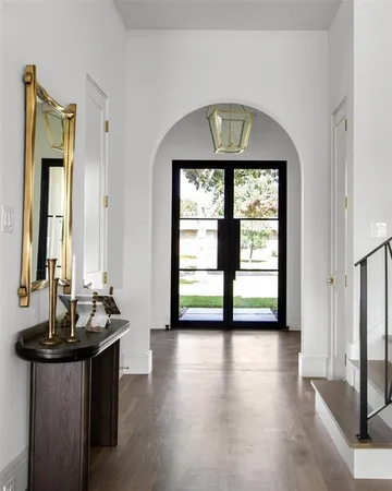 a view of an entryway with a hardwood floor