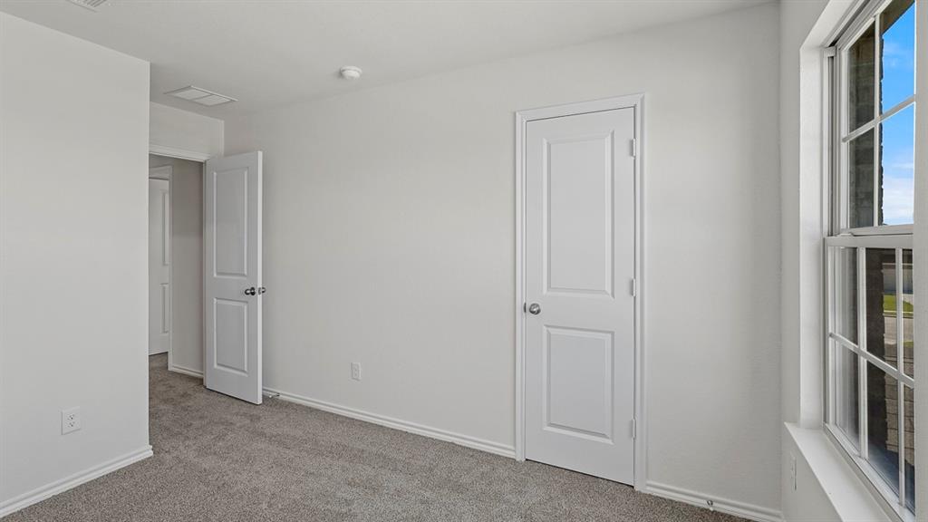 1627 Mantle Road Crandall, TX 75114 - Photo 38 of 40 Recessed lighting, light-colored walls, paneled interior doors, and neutral carpeting
