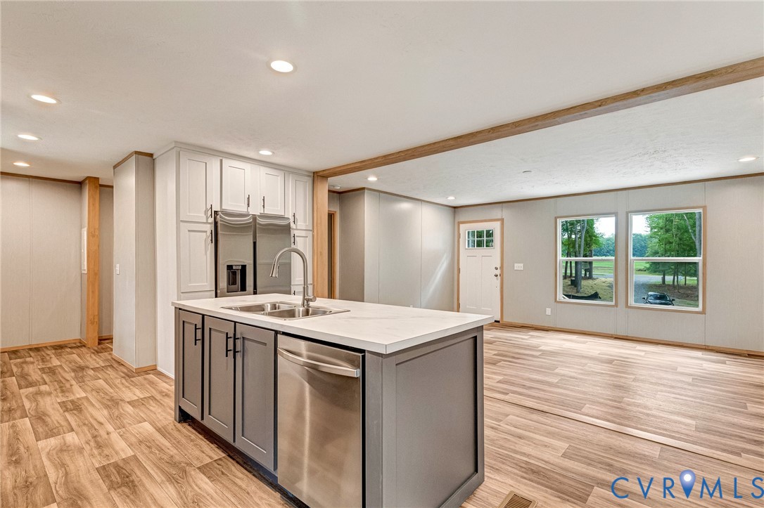15263 Cross County Road Mineral, VA 23117 - Photo 6 of 46 Kitchen island featuring a double-basin stainless