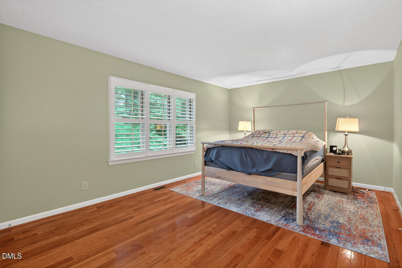 3307 Coachman's Way Durham, NC 27705 - Photo 29 of 50 a bedroom with a bed and window
