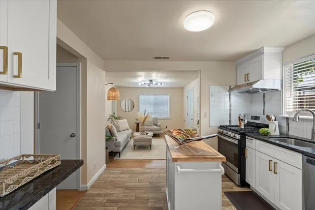 a bedroom with bed and a couch