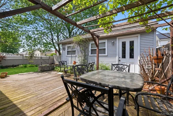 a view of a wooden bench on the deck
