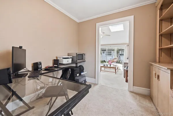 a view of a living room and dining room