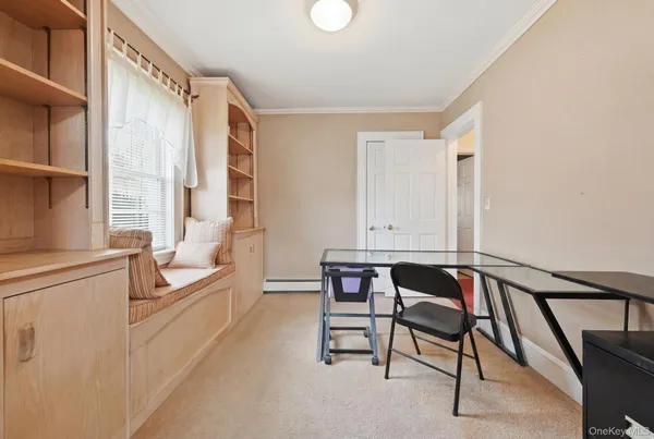 a view of a livingroom with furniture and furniture