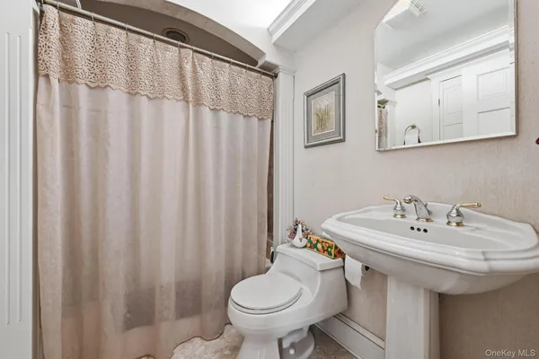 a bathroom with a sink and a toilet