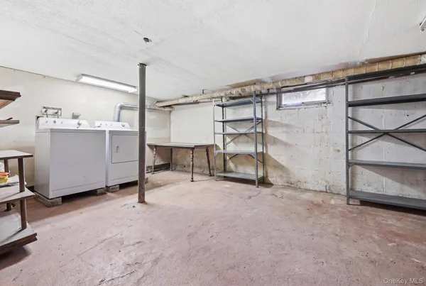 a view of a room with racks on the wall