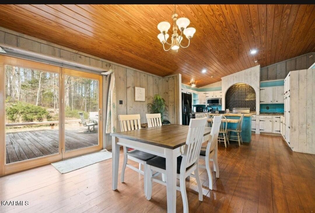 2122 Northwest Old River Road Charleston, TN 37310 - Photo 20 of 28 a view of a dining room with furniture window and outside view