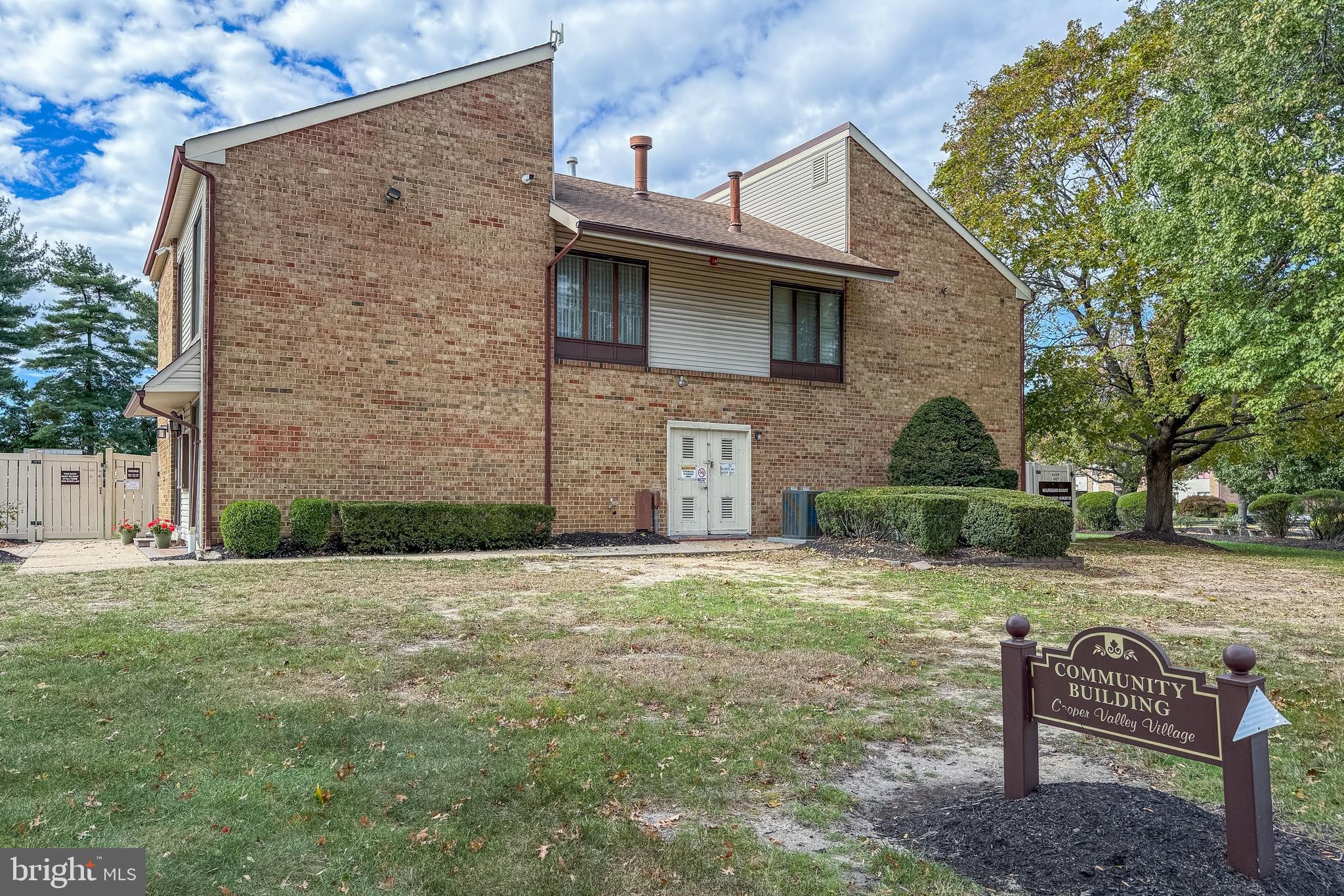 1475 Mt Holly Road, Unit L2 Beverly, NJ 08010 - Photo 24 of 28 a front view of a house with garden