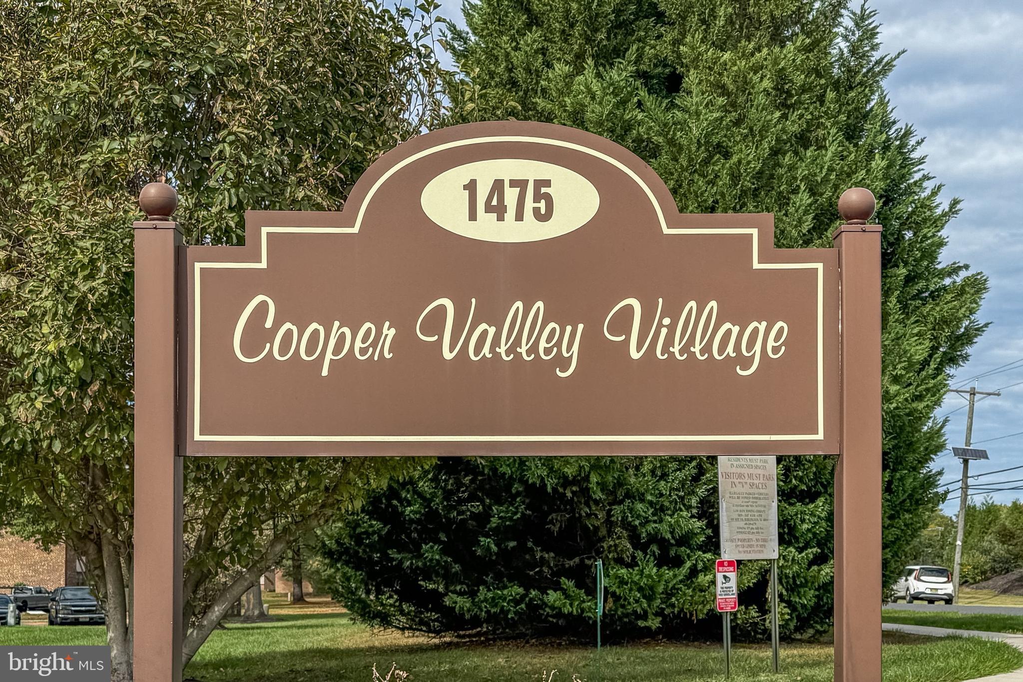 1475 Mt Holly Road, Unit L2 Beverly, NJ 08010 - Photo 28 of 28 a view of outdoor space with sign board and garden