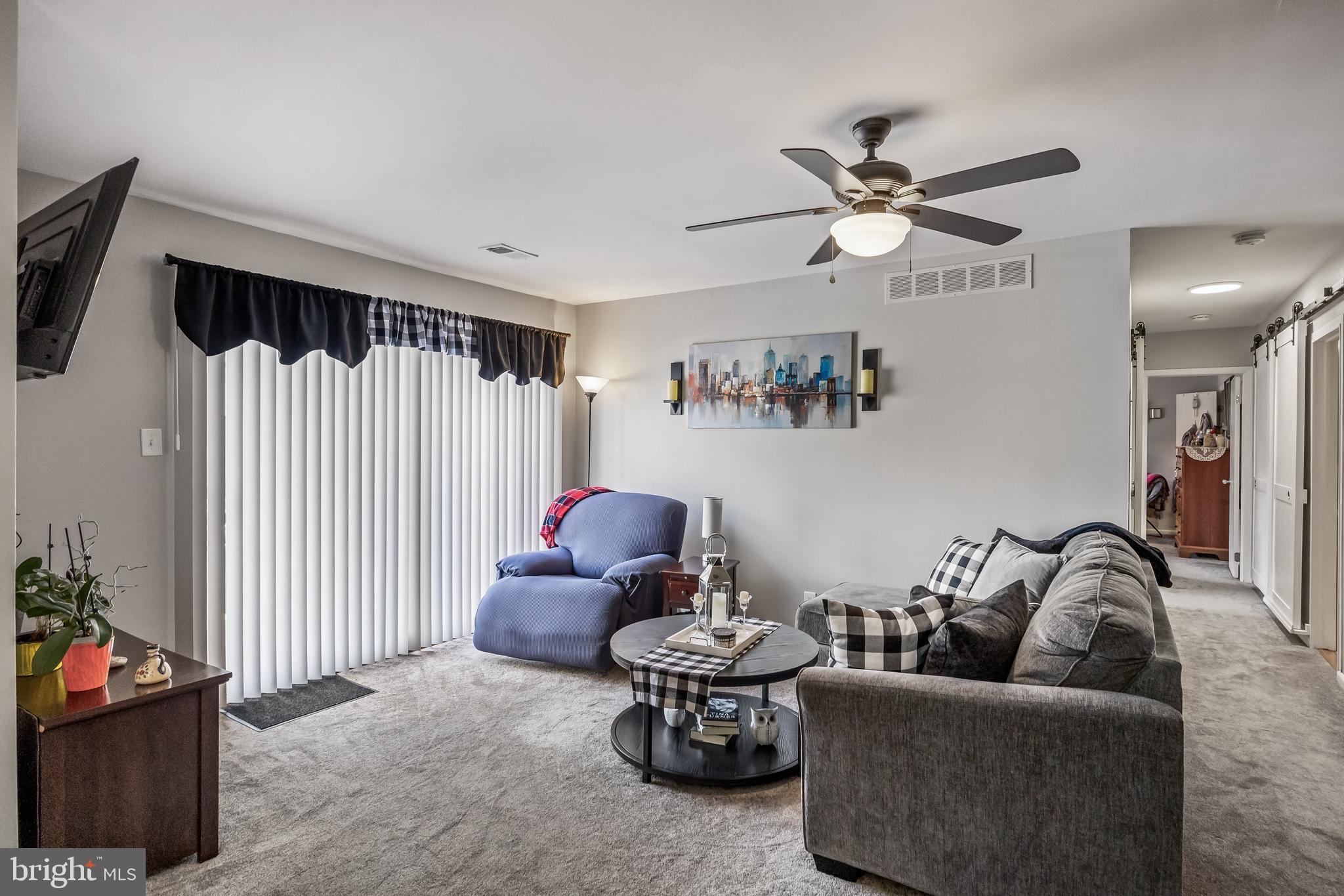 1475 Mt Holly Road, Unit L2 Beverly, NJ 08010 - Photo 4 of 28 a living room with furniture and a flat screen tv