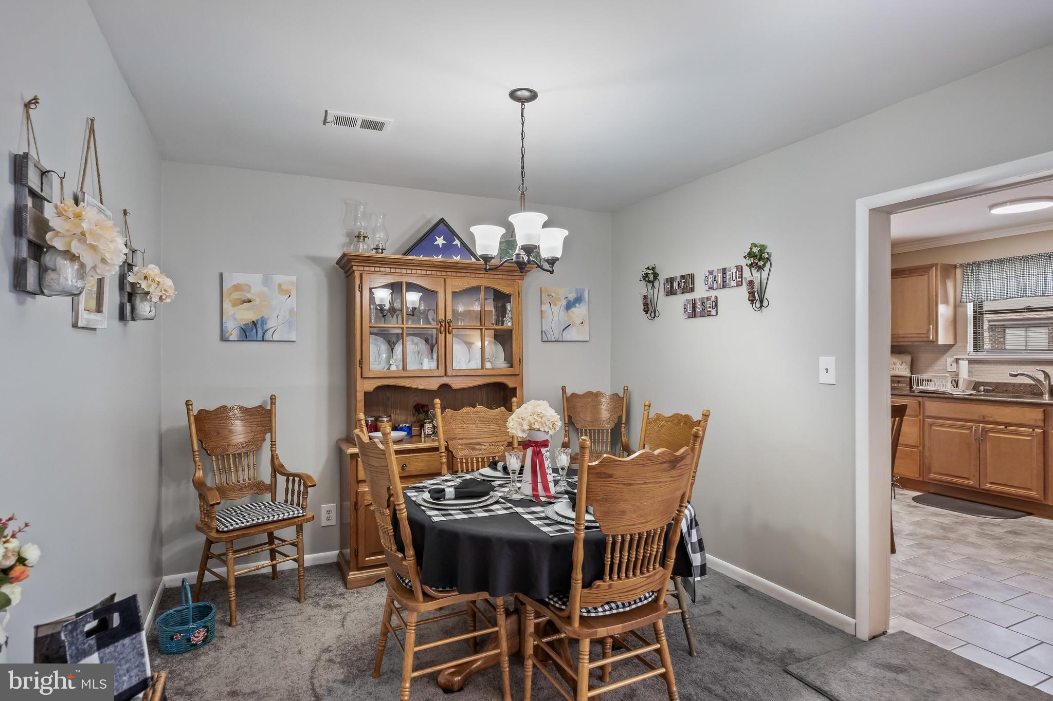 1475 Mt Holly Road, Unit L2 Beverly, NJ 08010 - Photo 8 of 28 a view of a dining room with furniture