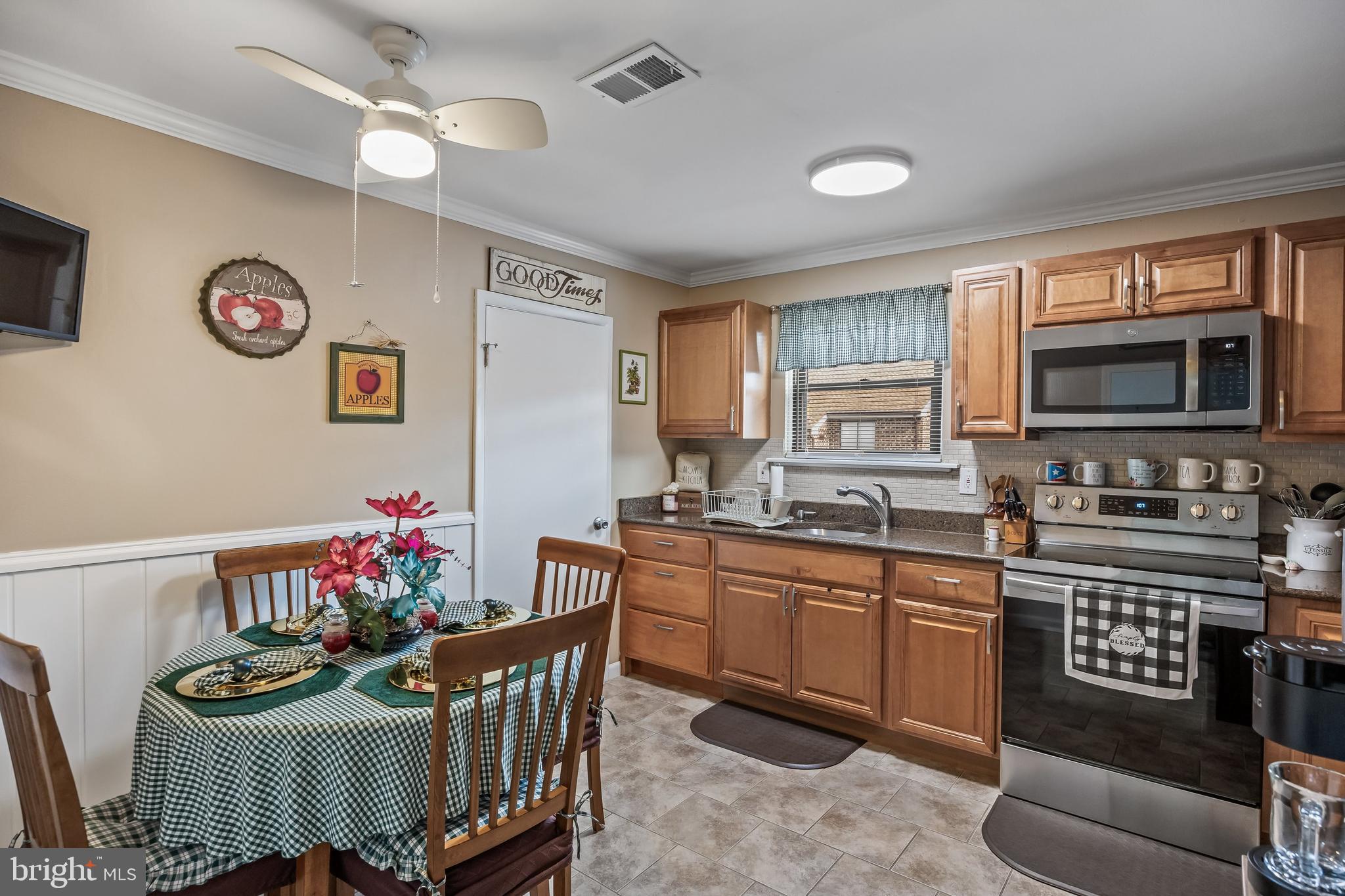 1475 Mt Holly Road, Unit L2 Beverly, NJ 08010 - Photo 9 of 28 a kitchen with granite countertop a sink cabinets and stainless steel appliances