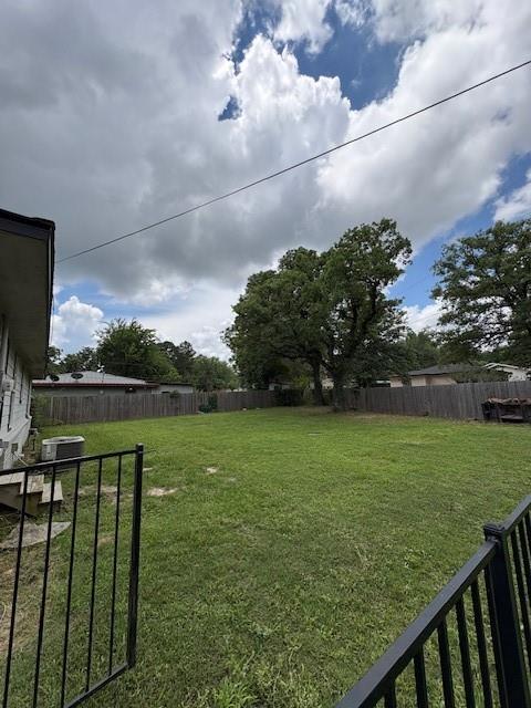 401 Reynolds Road Athens, TX 75751 - Photo 11 of 13 Expansive backyard with a fenced perimeter and mature trees