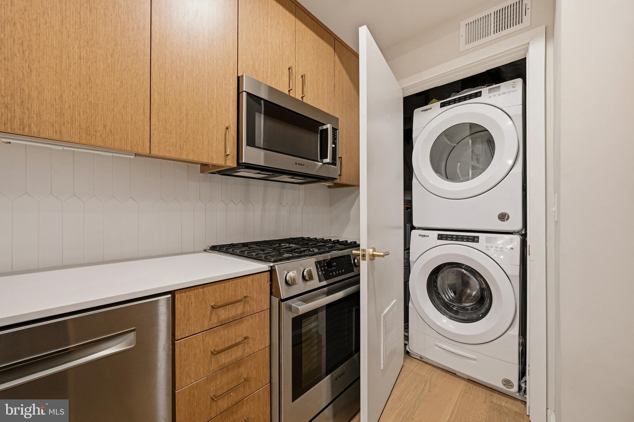 1402 12th Street Northwest, Unit 3 Washington, DC 20005 - Photo 15 of 23 a utility room with sink dryer and washer