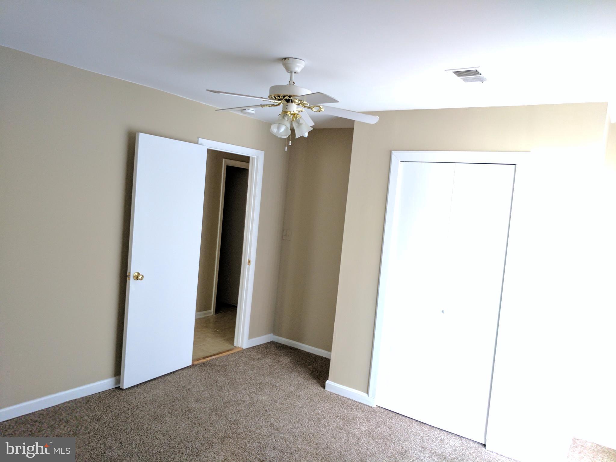5110 Berwyn Road College Park, MD 20740 - Photo 17 of 28 a view of a chandelier fan in a room