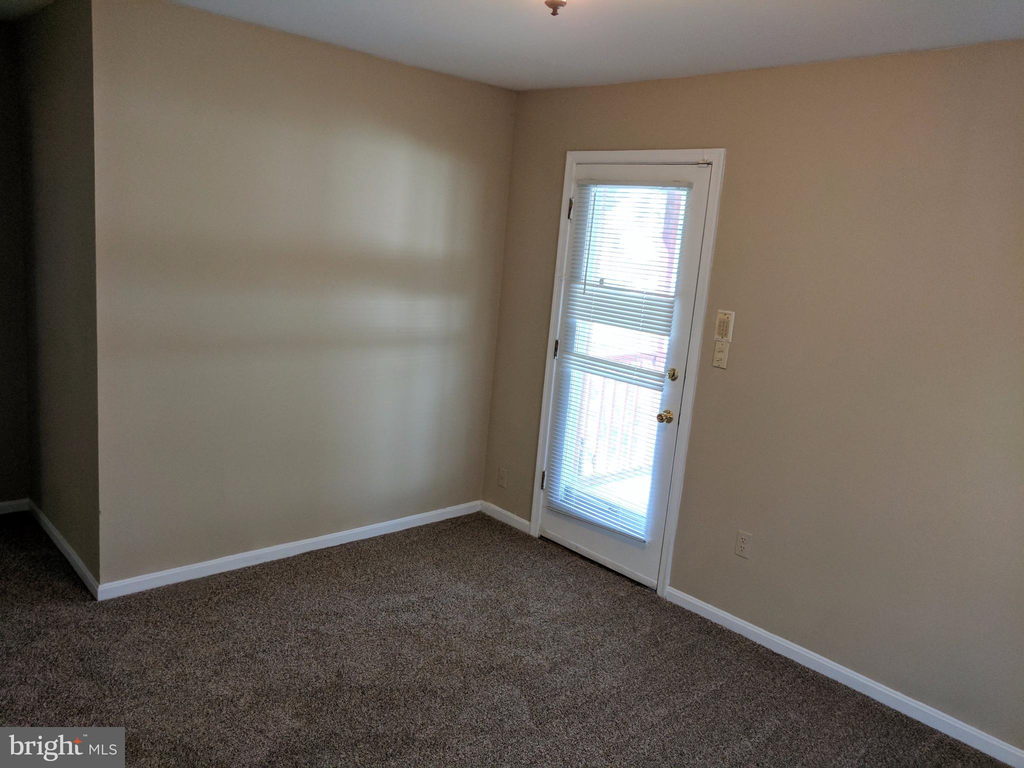 5110 Berwyn Road College Park, MD 20740 - Photo 22 of 28 an empty room with a window