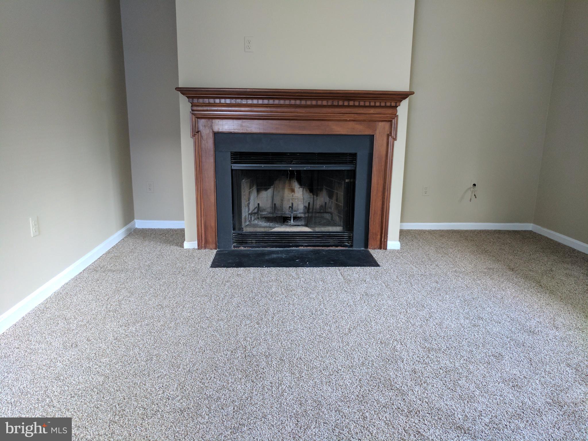 5110 Berwyn Road College Park, MD 20740 - Photo 7 of 28 a living room with a fireplace