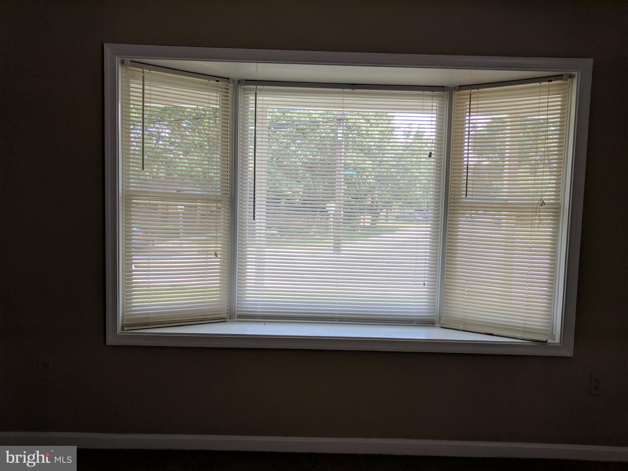 5110 Berwyn Road College Park, MD 20740 - Photo 8 of 28 a window that has a glass door