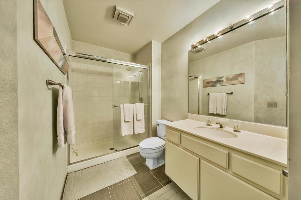 55384 Laurel La Quinta, CA 92253 - Photo 18 of 32 a bathroom with a sink a toilet and shower