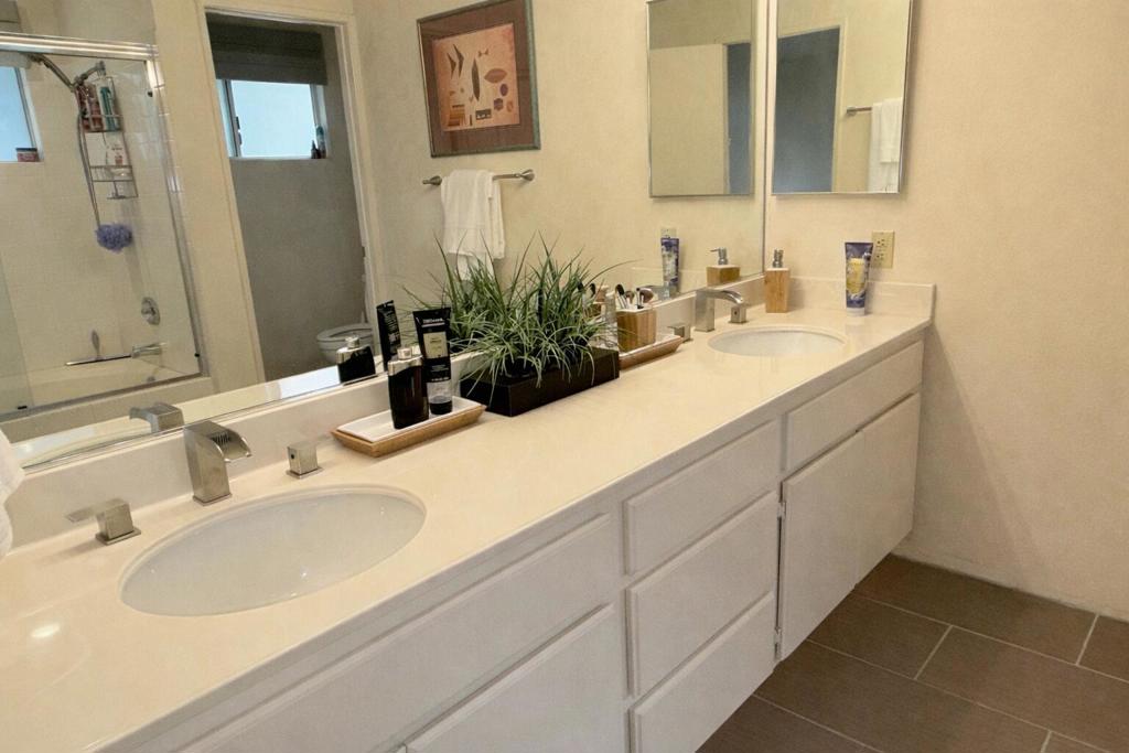 55384 Laurel La Quinta, CA 92253 - Photo 21 of 32 a bathroom with a sink and a mirror