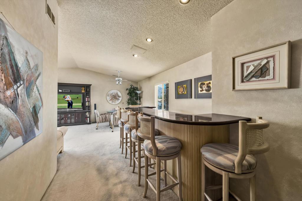 55384 Laurel La Quinta, CA 92253 - Photo 26 of 32 a view of a dining room with furniture and a livingroom