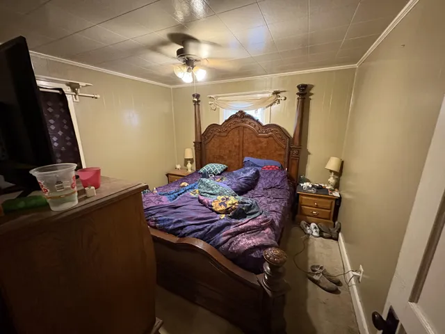 a white toilet sitting next to a bathroom sink
