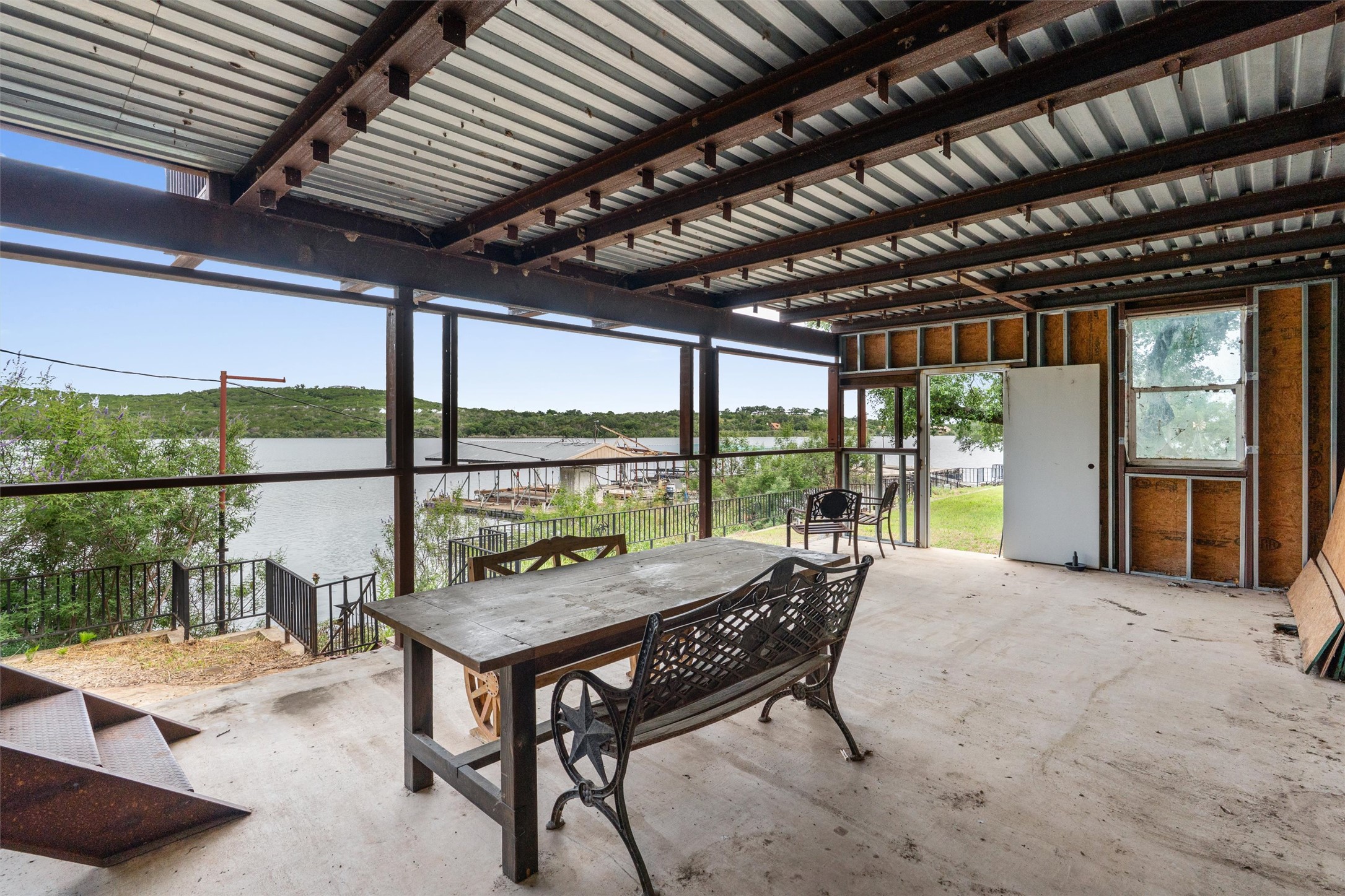 325 Eagle Rest Burnet, TX 78611 - Photo 37 of 40 Enjoy water views from this expansive covered patio, ideal for relaxing by the lake.
