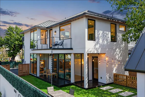 a front view of a house with garden