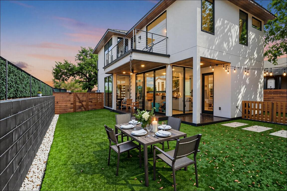1901 Hamilton Avenue Austin, TX 78702 - Photo 2 of 28 a view of a patio with a table and chairs