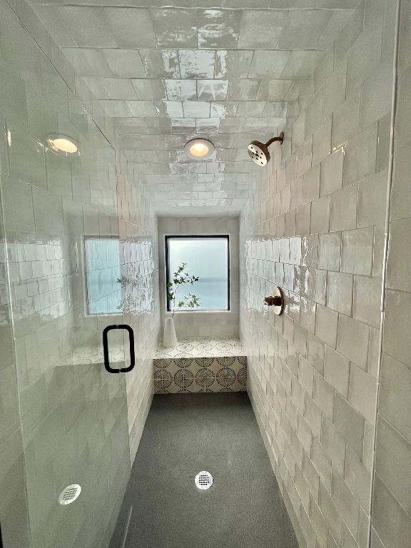 1901 Hamilton Avenue Austin, TX 78702 - Photo 25 of 28 a bathroom with a tub a sink and shower