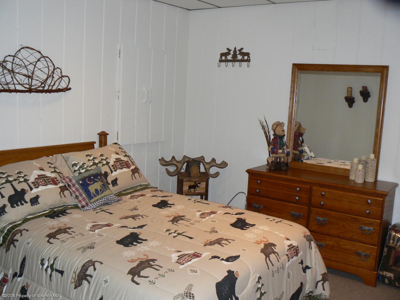 3198 Northgate Road Lake Ariel, PA 18436 - Photo 11 of 17 a bedroom with a bed and a dresser