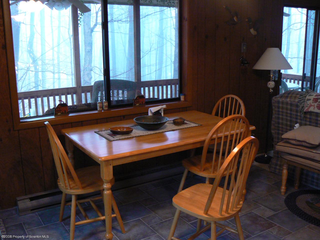3198 Northgate Road Lake Ariel, PA 18436 - Photo 3 of 17 a view of a dining room with furniture window and outside view