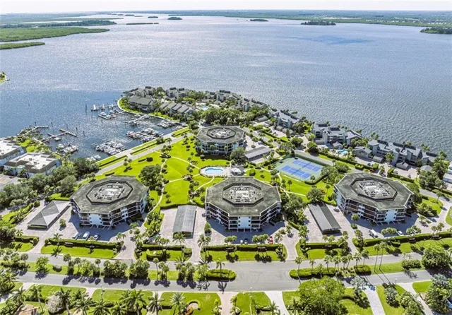 a view of swimming pool with outdoor seating and garden